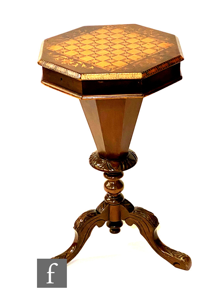 A Victorian marquetry inlaid octagonal sewing table with chequer board top, on trumpet pedestal base