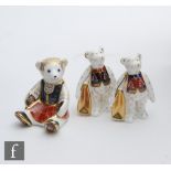 Three boxed Royal Crown Derby paperweights comprising Scottish Teddy Shona (with gold stopper), Mini