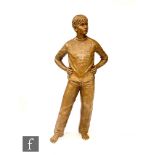 ANN HOGBEN (CONTEMPORARY) - Standing boy with hand on hip, bronze effect resin, signed and