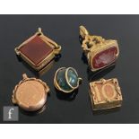 A 9ct hallmarked carnelian square sectioned fob, Chester 1909, with three further 9ct fobs, total