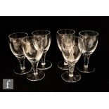 A group of six Stuart and Sons wine glasses in the Woodchester pattern, the ovoid bowl decorated