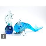 A Mdina glass figure modelled as a stylised dolphin, internally decorated with trails of citrine