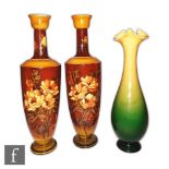 A pair of late 19th Century Bretby Pottery vases, each of slender ovoid form, rising from a