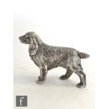 A hallmarked silver study of a standing field spaniel, in a naturalistic finish, height 7cm,