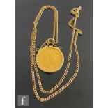 A 9ct half sovereign pendant and chain with loose mounted Edward VII half sovereign dated 1907,