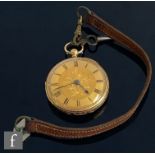 An 18ct hallmarked open faced key wind pocket watch, Roman numerals to a gilt dial, case diameter