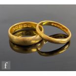 Two 22ct hallmarked D shaped wedding rings, total weight 7.4g. (2)