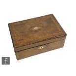 A Victorian crossbanded walnut work box, fitted interior, the lid inset with a mother of pearl