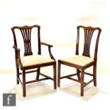 A set of six early 20th Century mahogany Hepplewhite style mahogany dining chairs including