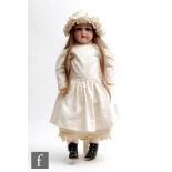 An Armand Marseille bisque socket head doll, with sleeping brown eyes, open mouth with teeth,