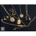 A small parcel lot of assorted jewellery to include locket and chains, various pendants and