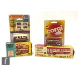 Four diecast models, a Dinky 283 Single Decker Bus, a Corgi 468 London Transport Routemaster Bus,