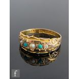 An early 20th Century 15ct hallmarked five stone turquoise and seed pearl boat shaped ring, claw set