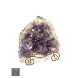 A large piece of natural amethyst crystal with speckled inclusions, width 30cm.