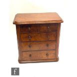 A Victorian mahogany straight front apprentice chest fitted with two short and three long drawers,