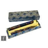 A Visa-ink two piece fountain pen and propelling pencil set in blue marble and brown effect case, in