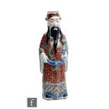A Chinese Late Qing Dynasty (1644-1912) / Republic period (1912-1949) figure of an immortal or