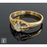 An early 20th Century 18ct gentleman's diamond solitaire ring, old cushion cut stone, weight