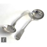 A pair of hallmarked silver fiddle pattern sauce ladles of plain form, weight 5oz, London 1835,