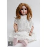 A late 19th Century German Kestner bisque socket head doll, sleeping brown eyes, open mouth with