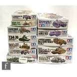 Twelve Tamiya 1:35 scale military plastic model kits, to include 35274-4600 British Main Battle Tank