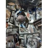 A collection of Eaglemoss Star Trek The Official Starships Collection vehicles and magazines, all