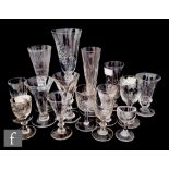 A collection of 18th Century and later drinking glasses to include plain, engraved, deceptive bowl