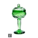 A 20th Century crystal pedestal powder bowl or bonbon dish and cover, cased in emerald green over