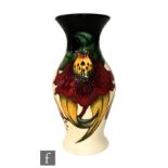 A Moorcroft Pottery vase decorated in the Anna Lily pattern designed by Nicola Slaney, impressed