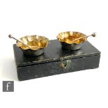 A boxed pair of hallmarked silver open salts with crimped borders and gilt bowls with conforming