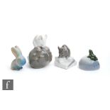 Three small Royal Copenhagen models of animals comprising a white mouse perched on a pebble model