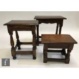 Three 17th Century style oak joint stools each on turned legs united by rail stretchers, the largest