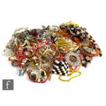 A parcel lot of 20th Century and later assorted costume jewellery to include beads, brooches, rings,