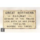 A cast iron sign for Great Northern Railway 'Beware of the Trains', 31.5cm x 56cm, and a forty