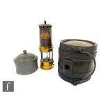 A Patersons brass miners lamp No 151, height 24cm, a lead tobacco jar and cover with tamper and