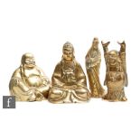 A collection of Chinese gilt metal figures to include Guanyin, height 20cm, two figures of Buddha