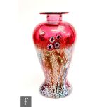 A contemporary Jonathan Harris Studio Glass vase of baluster form, decorated with murrine canes,