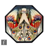 A Moorcroft Pottery octagonal plate decorated in the Eventide House - The Gate pattern designed by