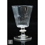 An 18th Century goblet circa 1790, the bucket bowl with moulded fluting above a short stem with