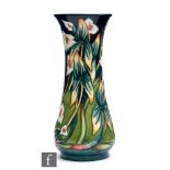 A Moorcroft Pottery vase decorated in the Elfin Beck pattern designed by Philip Gibson, impressed