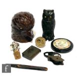 A small collection of assorted collectables to include two carved inkwells, one formed as the head