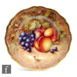 A Royal Worcester Fallen Fruits cabinet or wall plate decorated by Freeman with hand painted peaches