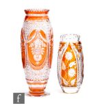 An early 20th Century continental crystal glass vases of footed swollen ovoid form with collar neck,