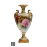 A Royal Worcester shape 1969 pedestal vase panel decorated with roses and foliage, puce mark with