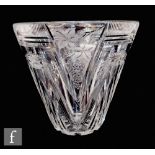 A large 20th Century clear crystal vase, of bucket form, with V cut pattern and grape and vine