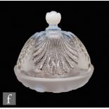 A 1930 Verlys pressed glass bowl of shallow circular section, relief moulded with sea shells in a