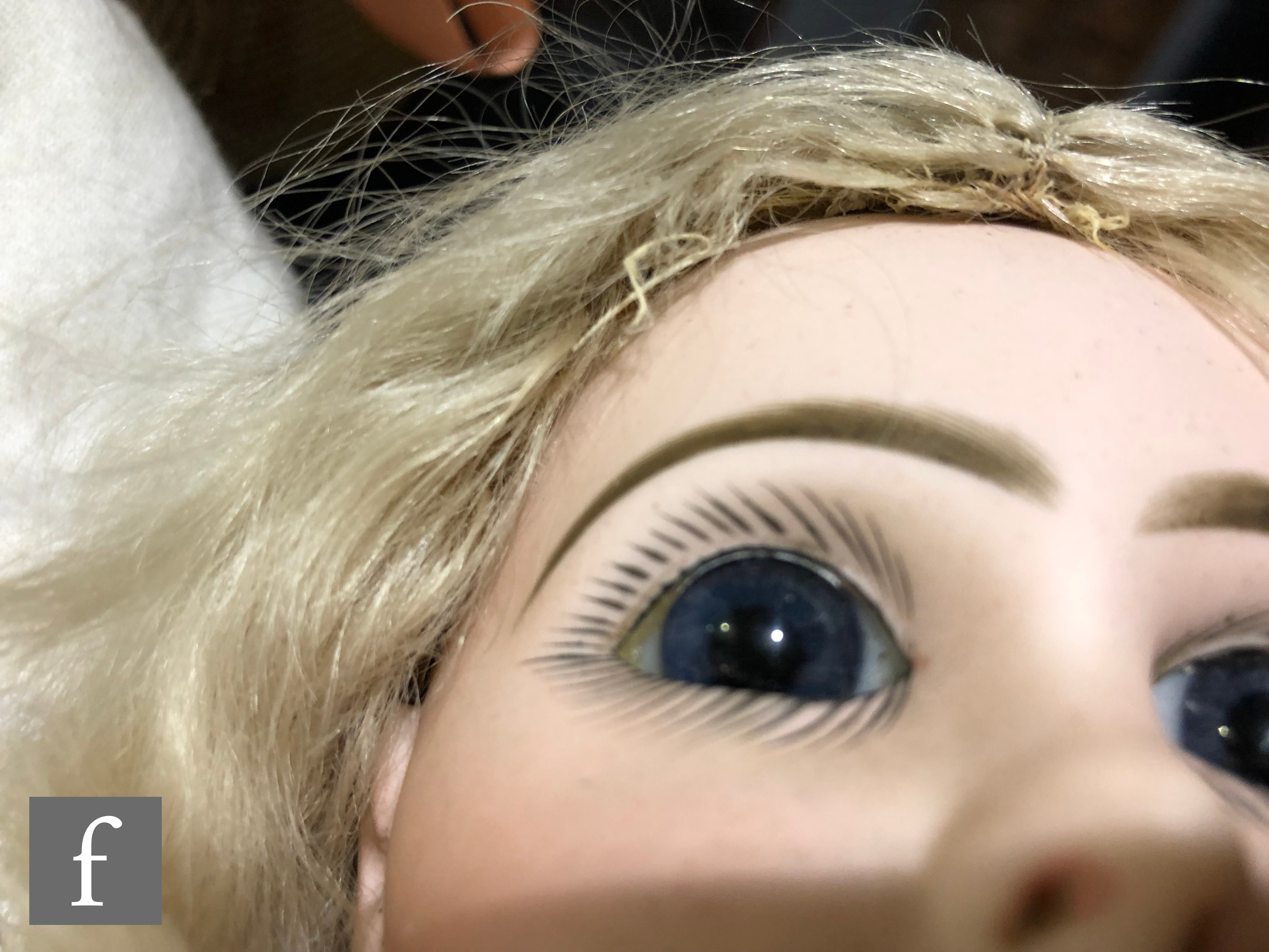 An unmarked French bisque head doll, probably Jumeau, with fixed blue paperweight eyes, painted - Image 7 of 7