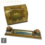 An early 20th Century leather desk stationary box and matching pen tray with two fitted inkwells,
