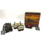 An O gauge Hornby MO Passenger Train Set, comprising 0-4-0 green 2595 clockwork locomotive, two