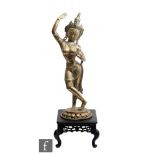 A Tibetan gilt metal bodhisattva figure modelled in dancing position, hands cast in Vitakra Mudra,